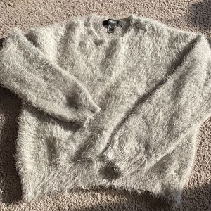 Grey/Silver fuzzy pullover.